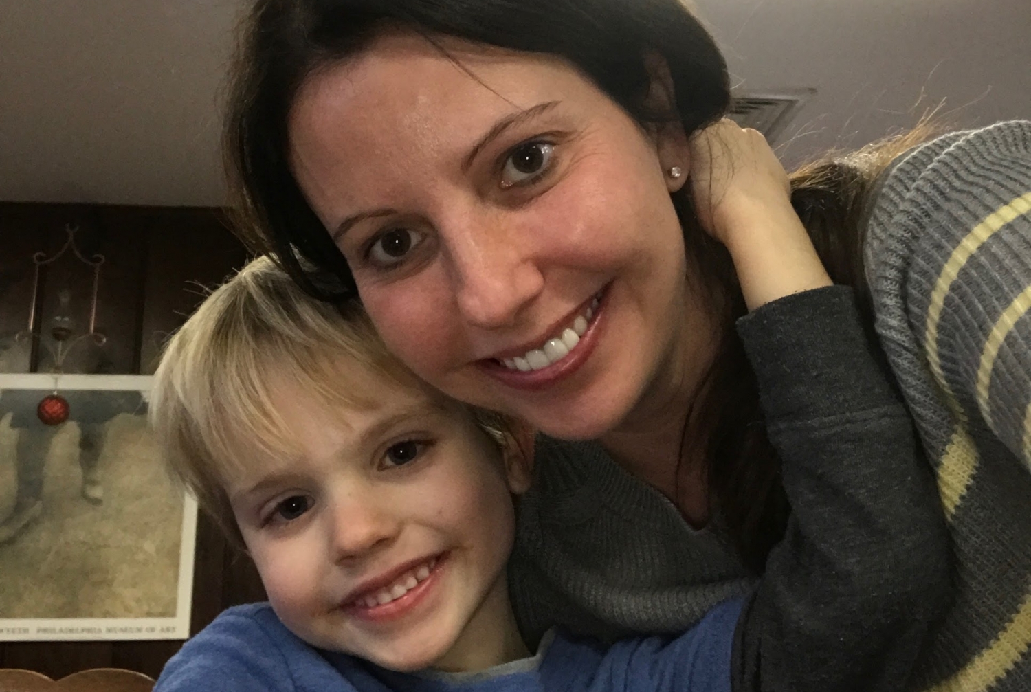 Seven-year-old A.J. Henwood with his mom, Nicole.